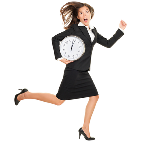 Stressed woman holding a clock